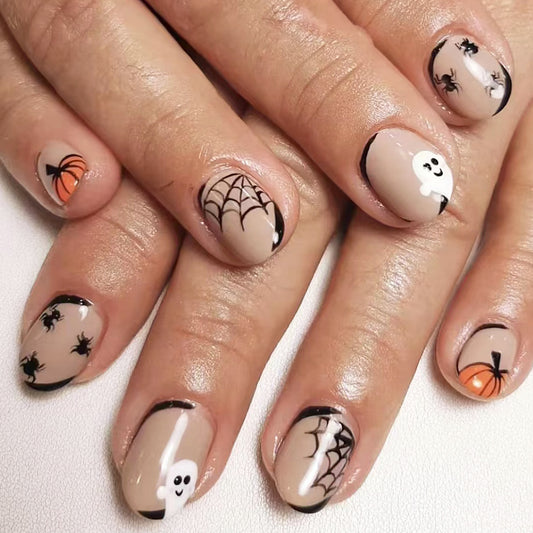 Spooky Seasonal Short Oval Beige Press On Nail Set with Halloween Themed Ghosts and Pumpkins