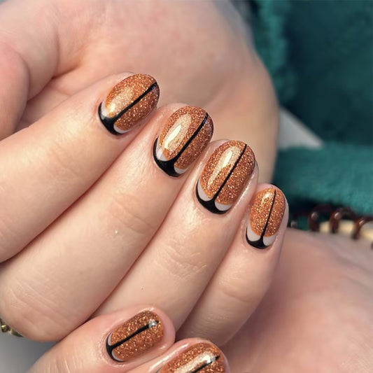 Basketball Court Inspired Short Oval Glitter Orange Press On Nail Set with Stylish Black Stripes