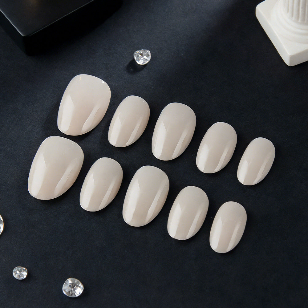 Elegant Serenity Short Oval Shaped Soft Beige Press On Nail Set with Glossy Finish