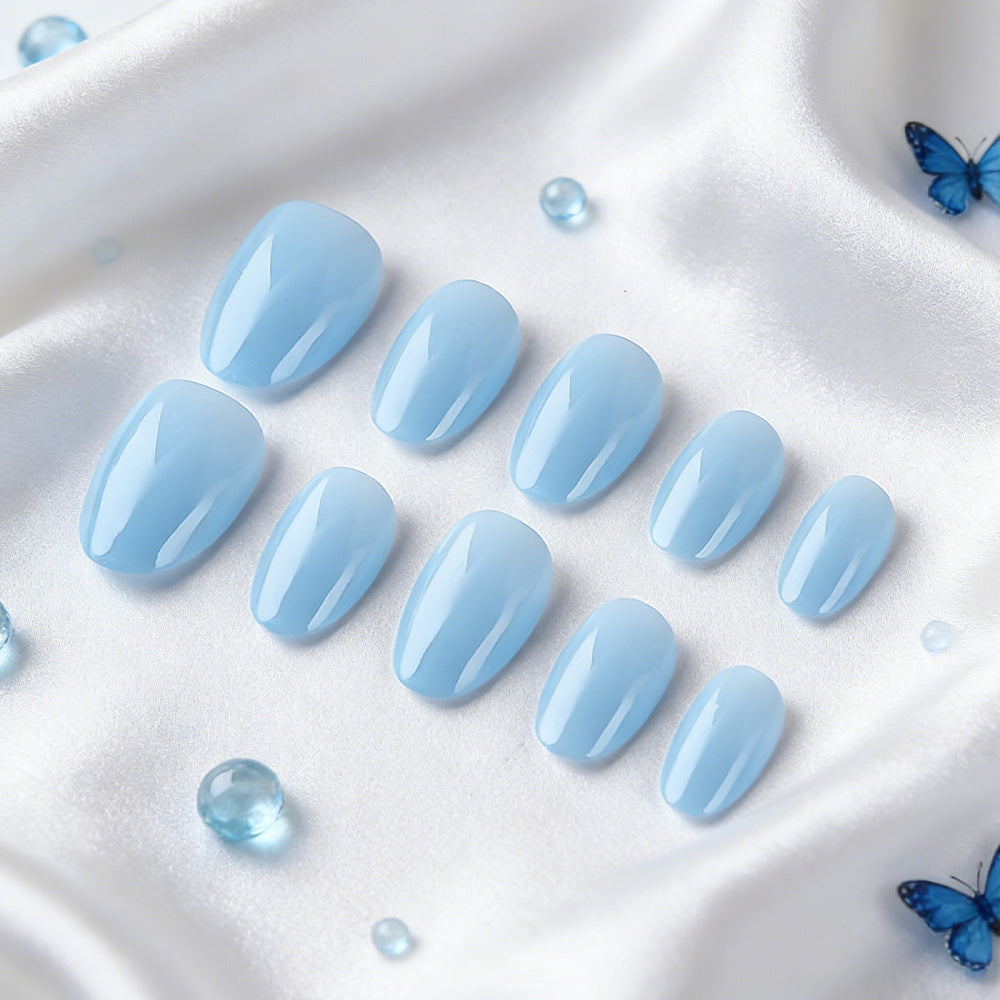 Serene Sky Dreamscape Press On Nail Set Short Oval Shaped Soft Blue Glossy Finish