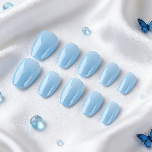 Serene Sky Dreamscape Press On Nail Set Short Oval Shaped Soft Blue Glossy Finish