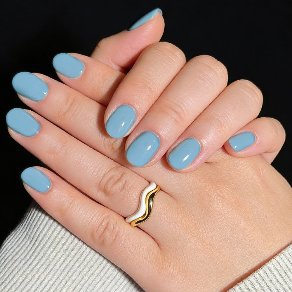Serene Ocean Vibes Short Oval Sky Blue Glossy Press-On Nail Set with Curved Design