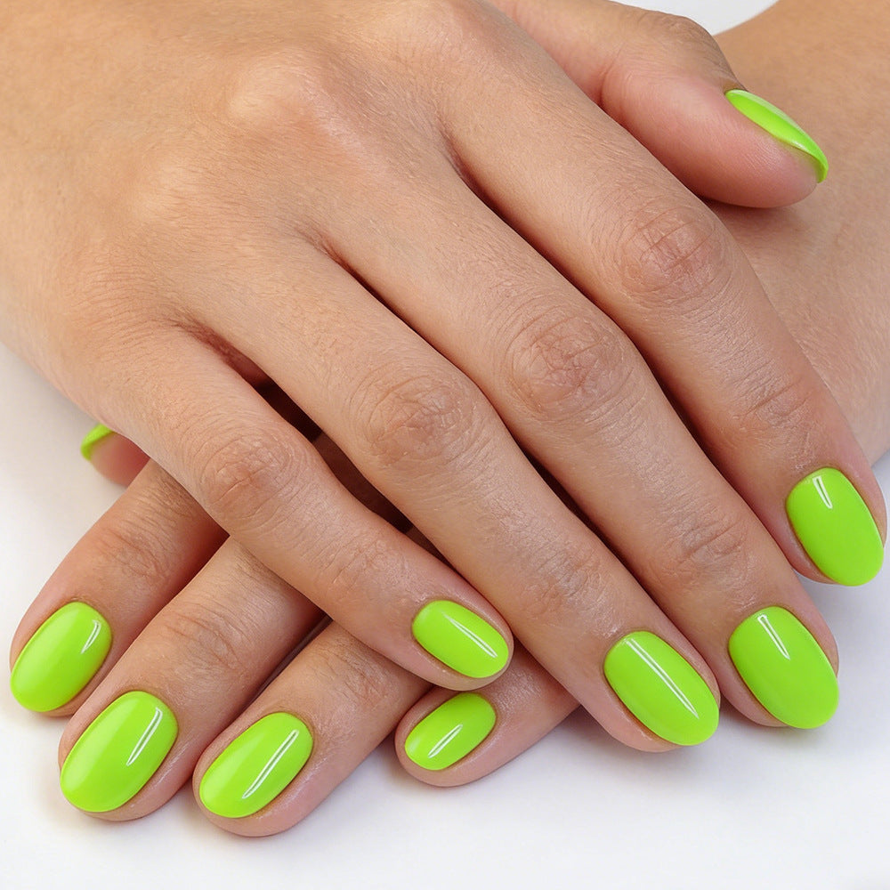 Bright Jungle Vibes Short Oval Neon Green Glossy Press On Nail Set Featuring Stunning Shine