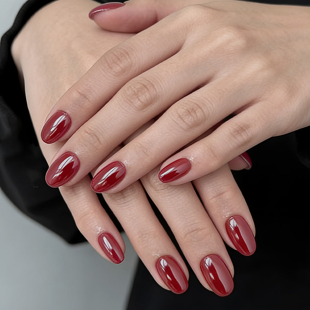 Elegant Enchantment Short Oval Deep Red Glossy Nail Set With Stunning Ombre Effect