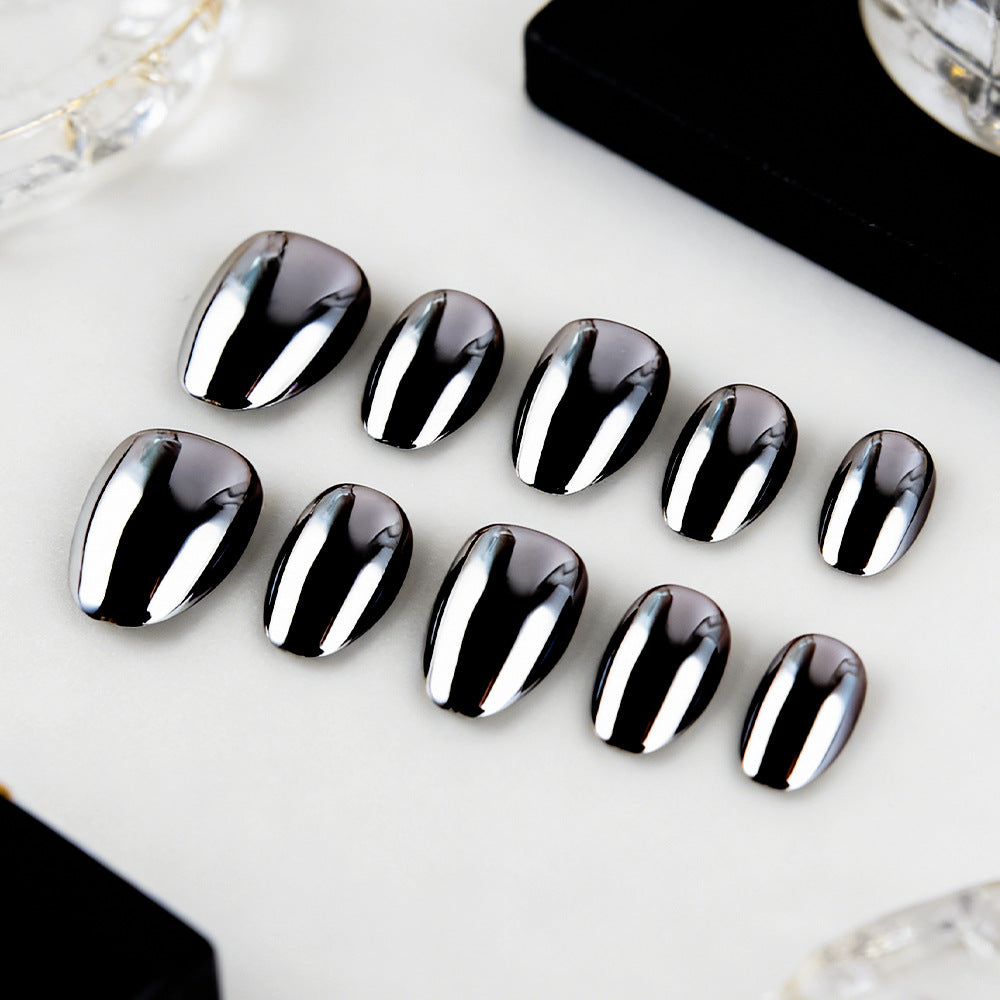 Glamorous Midnight Shine Short Oval Black Chrome Press On Nail Set with Stunning Reflective Finish