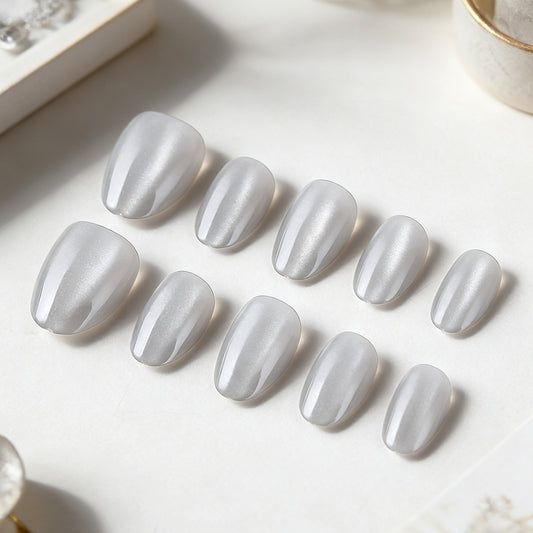 Enchanted Silver Short Oval Shaped Press On Nail Set with Glamorous Shimmer Finish