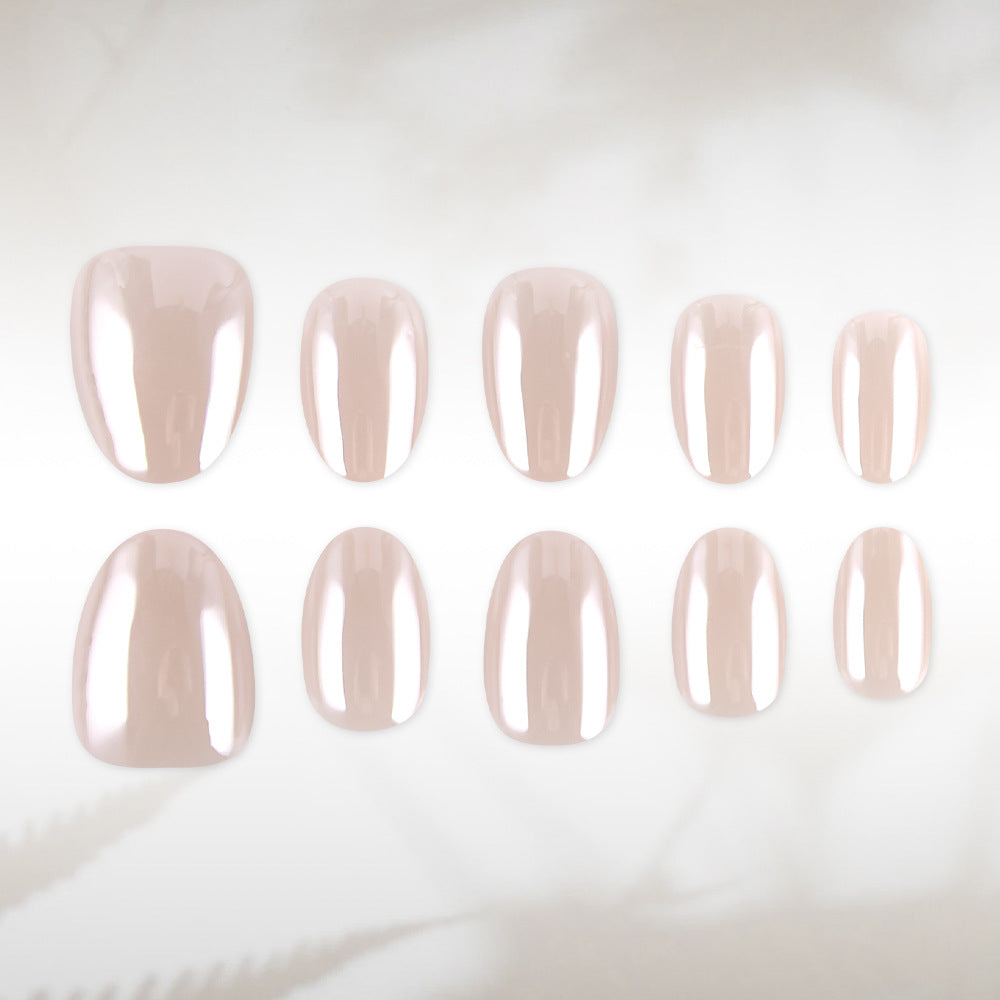 Chic Elegance Shimmering Short Oval Shaped Blush Pink Press On Nail Set Featuring Glossy Finish