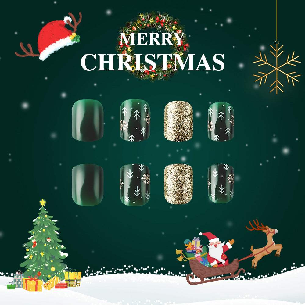 Nail art set with Christmas-themed decorations on a festive green background.