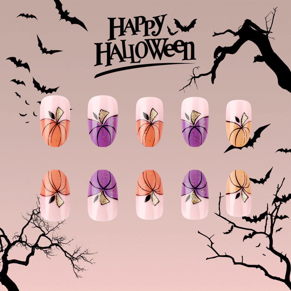Spooky Oval Short Press on Nail Set with Festive Pumpkin Design