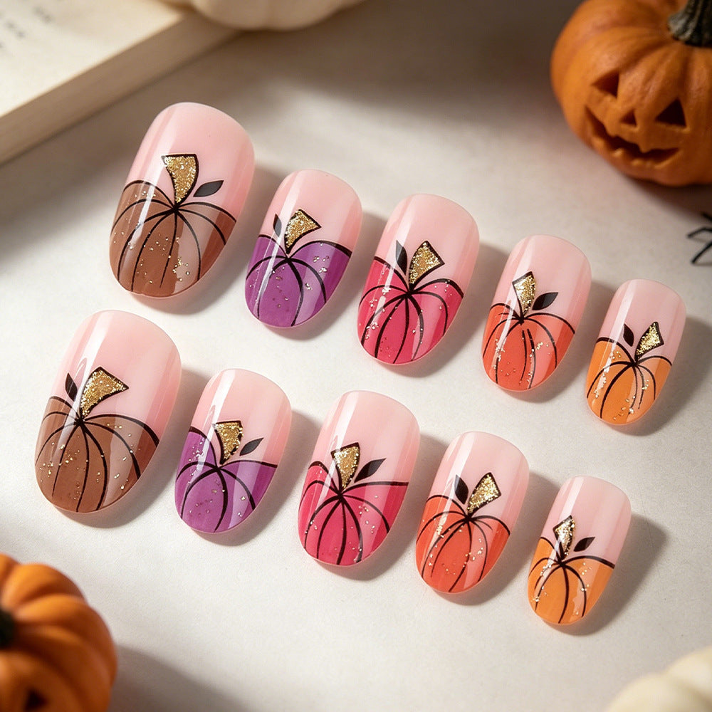 Autumn Elegance Short Oval Pink Ombre Press-On Nail Set with Glitter Pumpkin Design