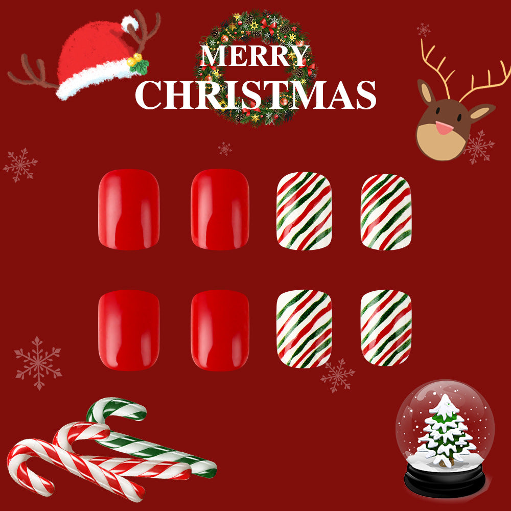 festive holiday cheer medium oval red and white striped press on nails with candy cane design