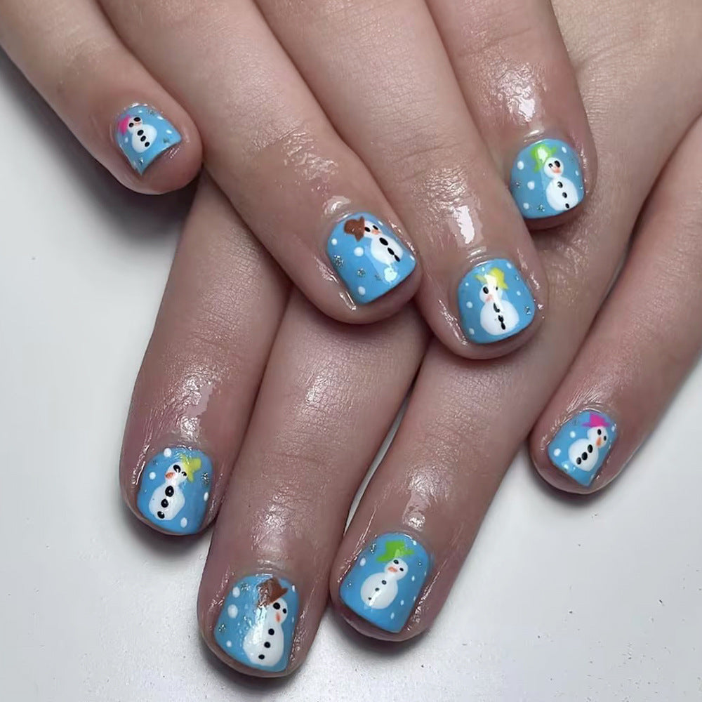 Nails with snowman design on a white background