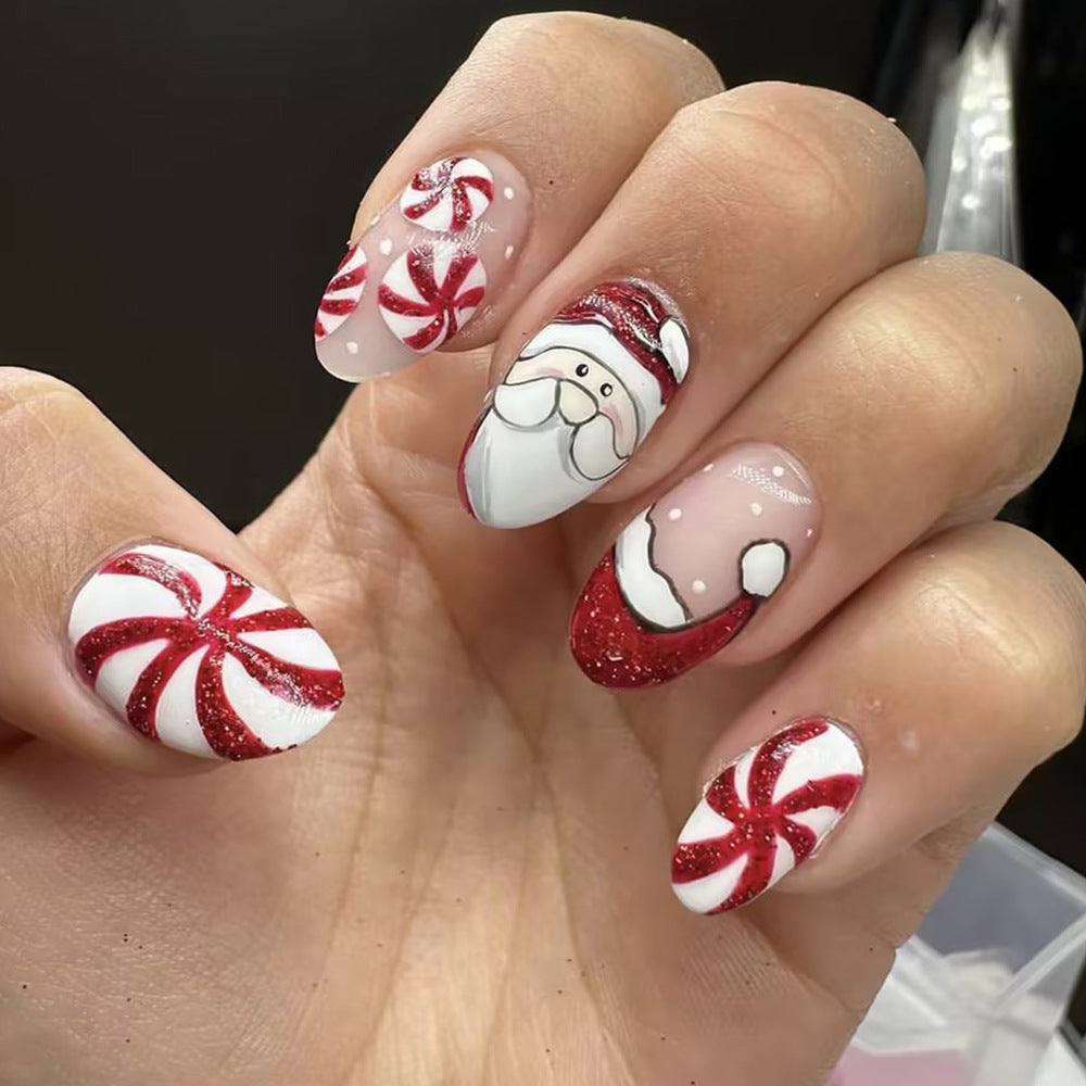 Festive Glam Christmas Oval Press On Nails Long Red and White Peppermint Design with Glittery Santa Accent