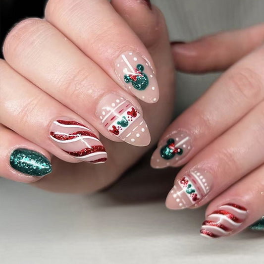 Festive Holiday Magic Long Almond Green And Red Glitter Press On Nail Set With Unique Christmas Themed Designs