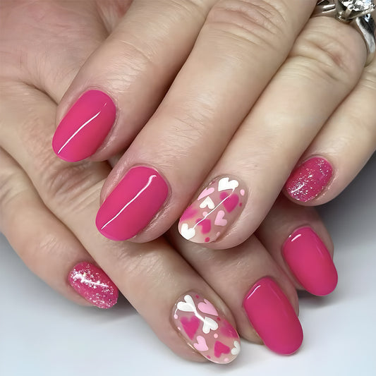 Hand with pink nail polish on a white background