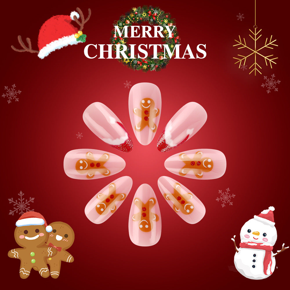 Festive Gingerbread Inspired Medium Almond Pink Nail Set with Glittering Red Tips and Adorable Gingerbread Man Design