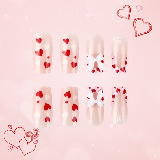 Romantic Valentine Inspired Long Square Soft Pink Press on Nail Set with Heart Designs and Bow Accents