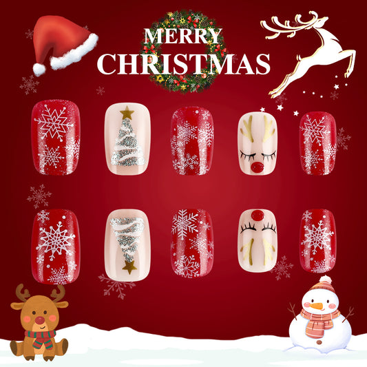 A set of red oval nails with glittering snowflake and reindeer designs, displayed against a festive Christmas themed background.