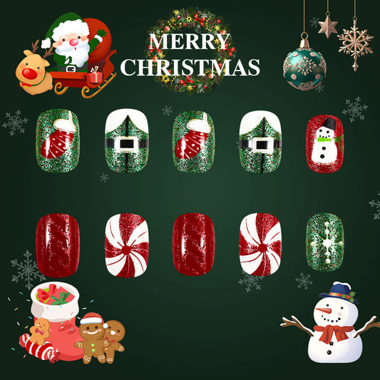 A set of press-on nails featuring a variety of holiday-themed designs including Santa Claus, a reindeer, and candy cane patterns primarily in red and green colors.