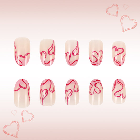 Romantic Heartfelt Medium Oval Pink Design Press-On Nail Set with Intricate Swirls
