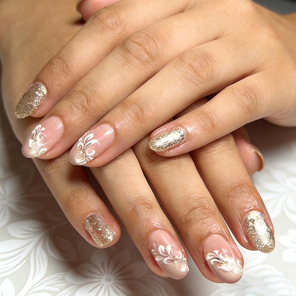 Elegant Gold Floral Design Short Oval Press-On Nail Set with Glitter Accent