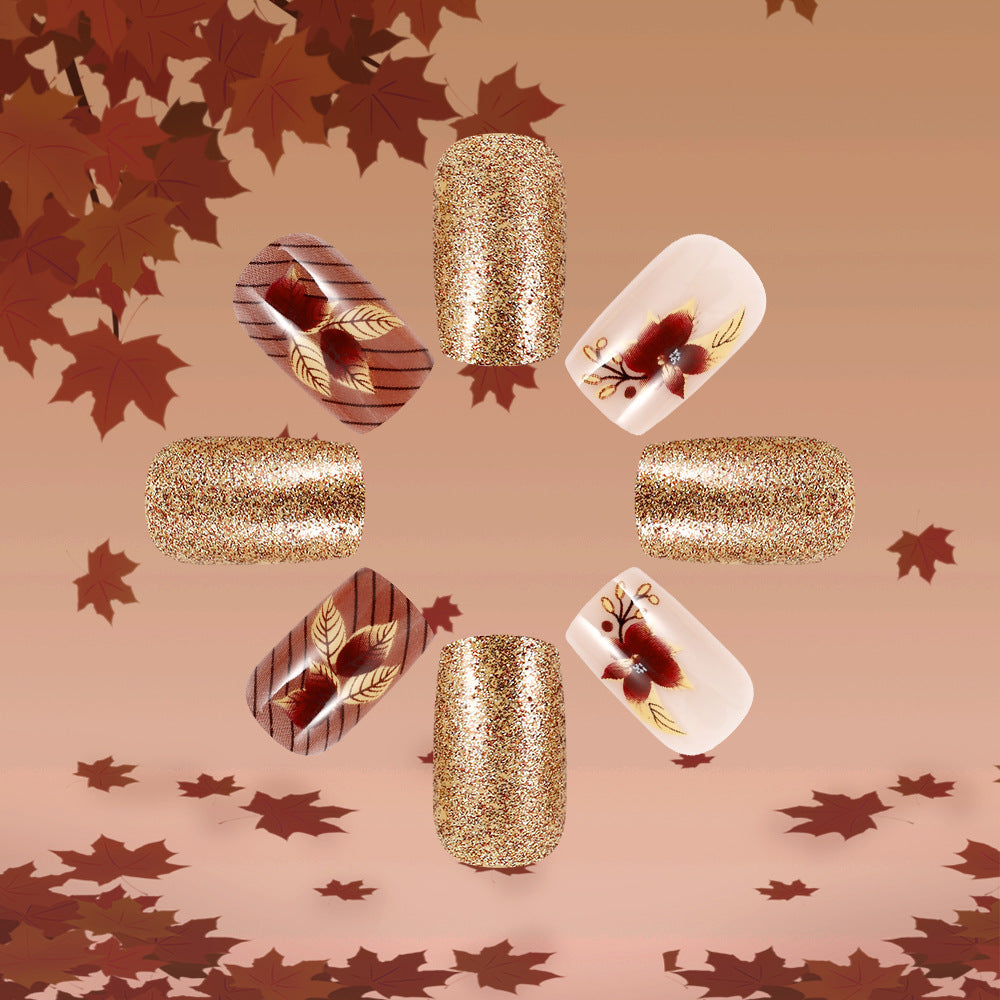 Autumn Elegance Gold Glitter Medium Square Nails with Unique Leaf Designs