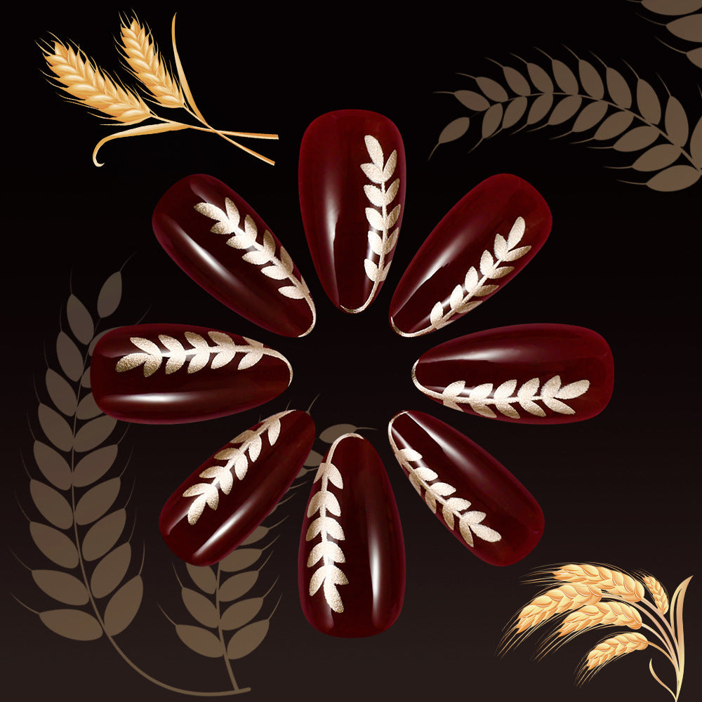 Autumn Harvest Elegant Short Almond Red Nails with Golden Leaf Designs
