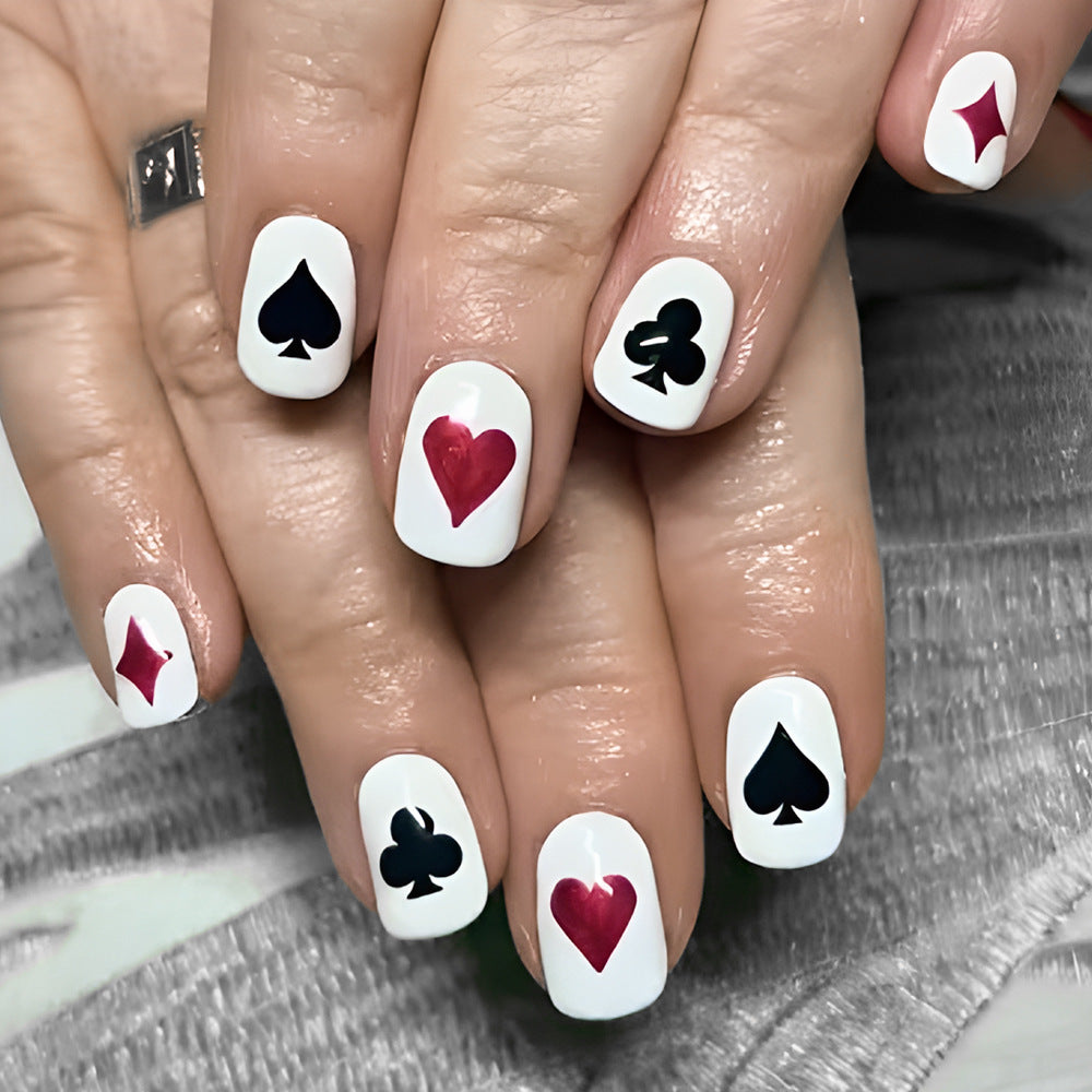 Glamorous Card Game Inspired Short Square White Press On Nail Set with Bold Red and Black Playing Card Designs