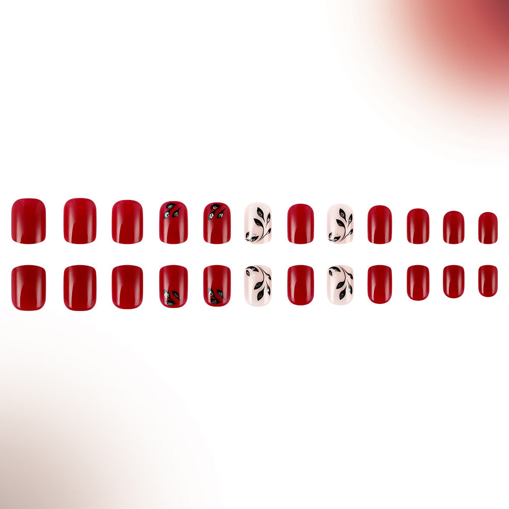 Glamorous Romance Short Square Red Nail Set with Intricate Black Leaf Designs