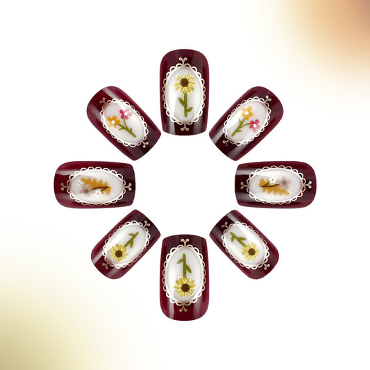 Rustic Charm Short Squoval Burgundy Floral Press On Nail Set with Delicate White Frame Design