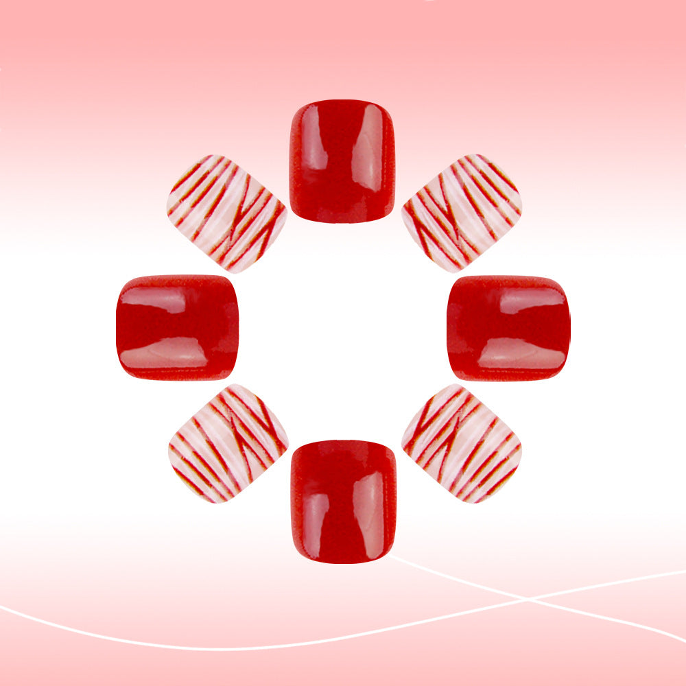 Festive Red Charm Short Squoval Press-on Nail Set with Striped Accent Design