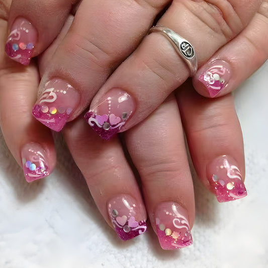 Enchanting Romance Medium Square Pink Glitter Ombre Nail Set with Heart and Gem Accents
