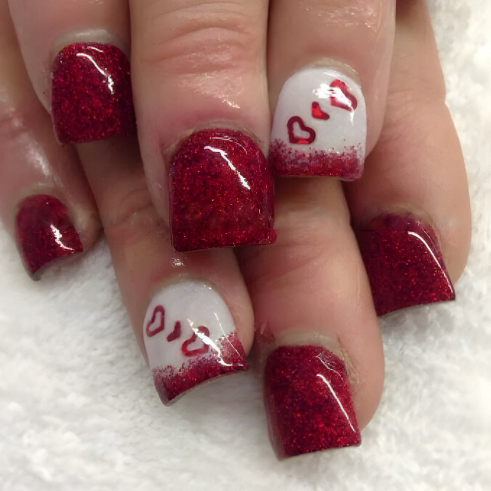 Romantic Hearts Themed Short Square Red Glitter Press On Nail Set with White Accent and Heart Design