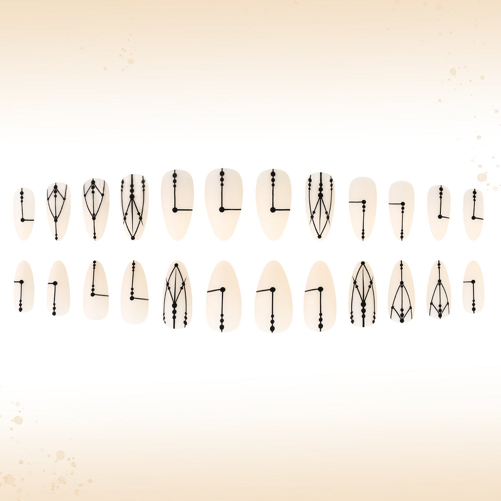 Mystical Geometry Press On Nail Set Medium Almond Ivory with Daring Black Detailing
