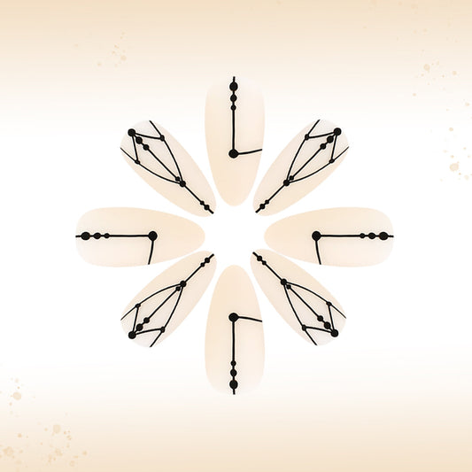 Celestial Elegance Long Almond Off-White Nail Set with Unique Geometric Black Designs