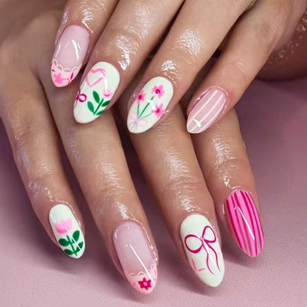 Floral Fantasy Medium Almond Pink Press-On Nail Set with Charming Botanical Designs