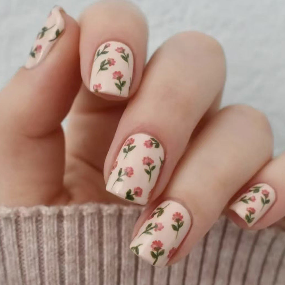 Floral Elegance Short Square Pastel Pink Temporary Nail Set with Charming Leafy Print Feature