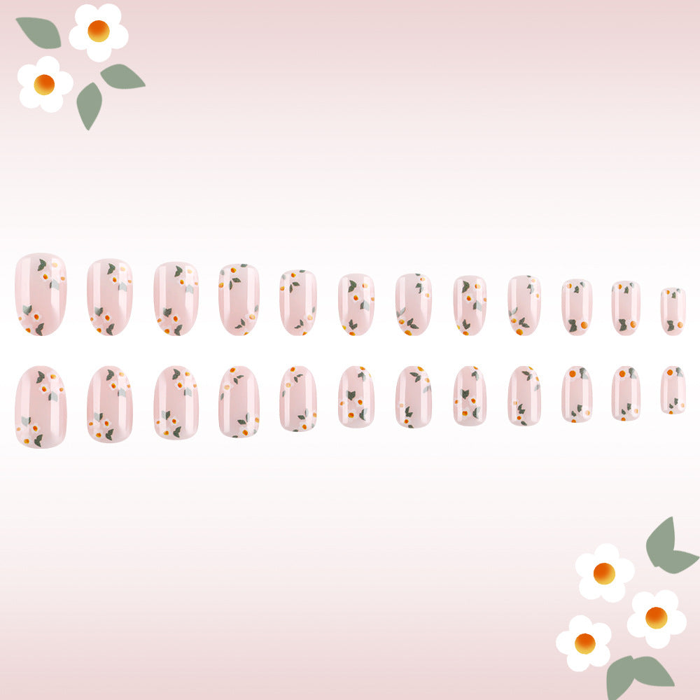 Floral Fantasy Medium Oval Pink Press-On Nail Set with Charming Flower Accents