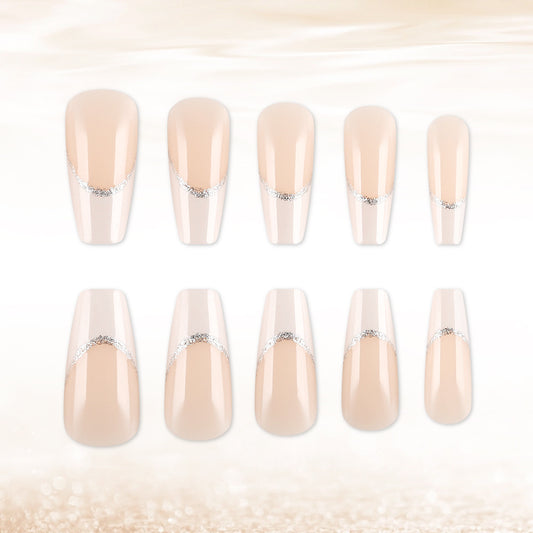 Elegant Serenity Long Coffin Beige Nails with Shimmering Silver Accent