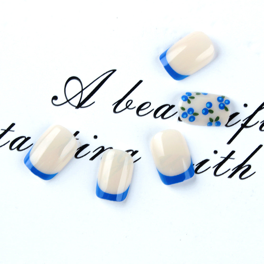 Whimsical Blossom Short Squoval Blue Trim Nail Set with Floral Accent