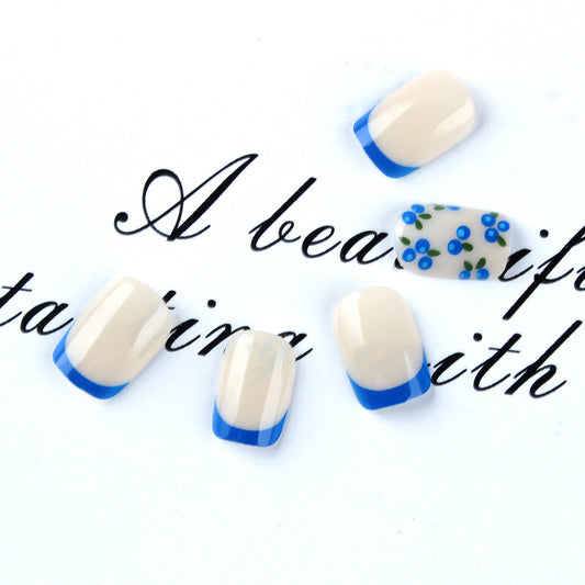 Whimsical Blossom Short Squoval Blue Trim Nail Set with Floral Accent