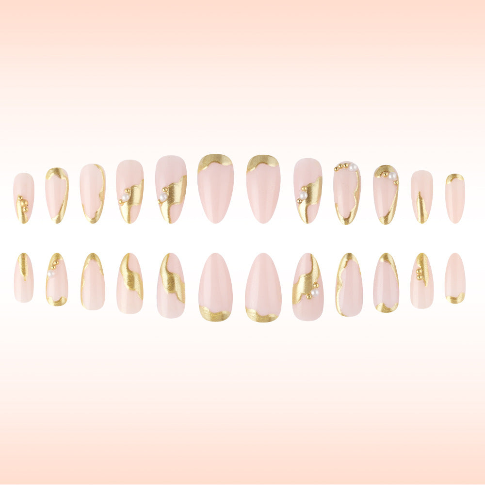 Whimsical Elegance Long Almond Blush Pink Press On Nail Set with Gold Accents and Unique Pearl Embellishments