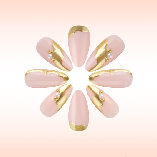 Elegant Blossom Long Almond Pink Nails with Gold Trim and Pearls