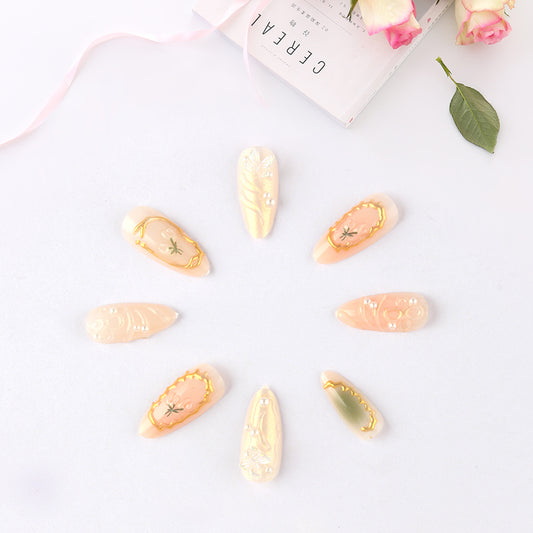 Whimsical Garden Inspired Long Almond Shaped Pink Press On Nail Set with Unique Floral Designs