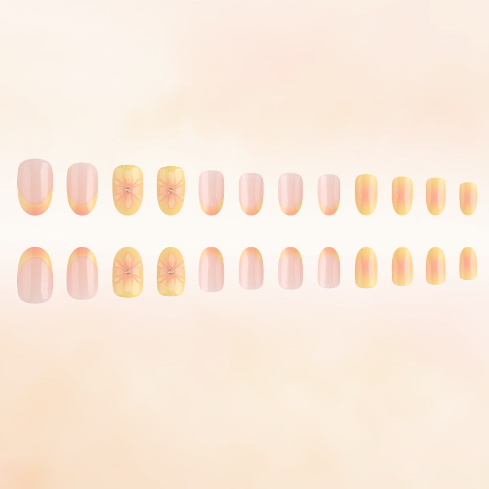 Citrus Sunrise Elegant Medium Oval Soft Pink and Yellow Gradient with Floral Accent Press-On Nail Set