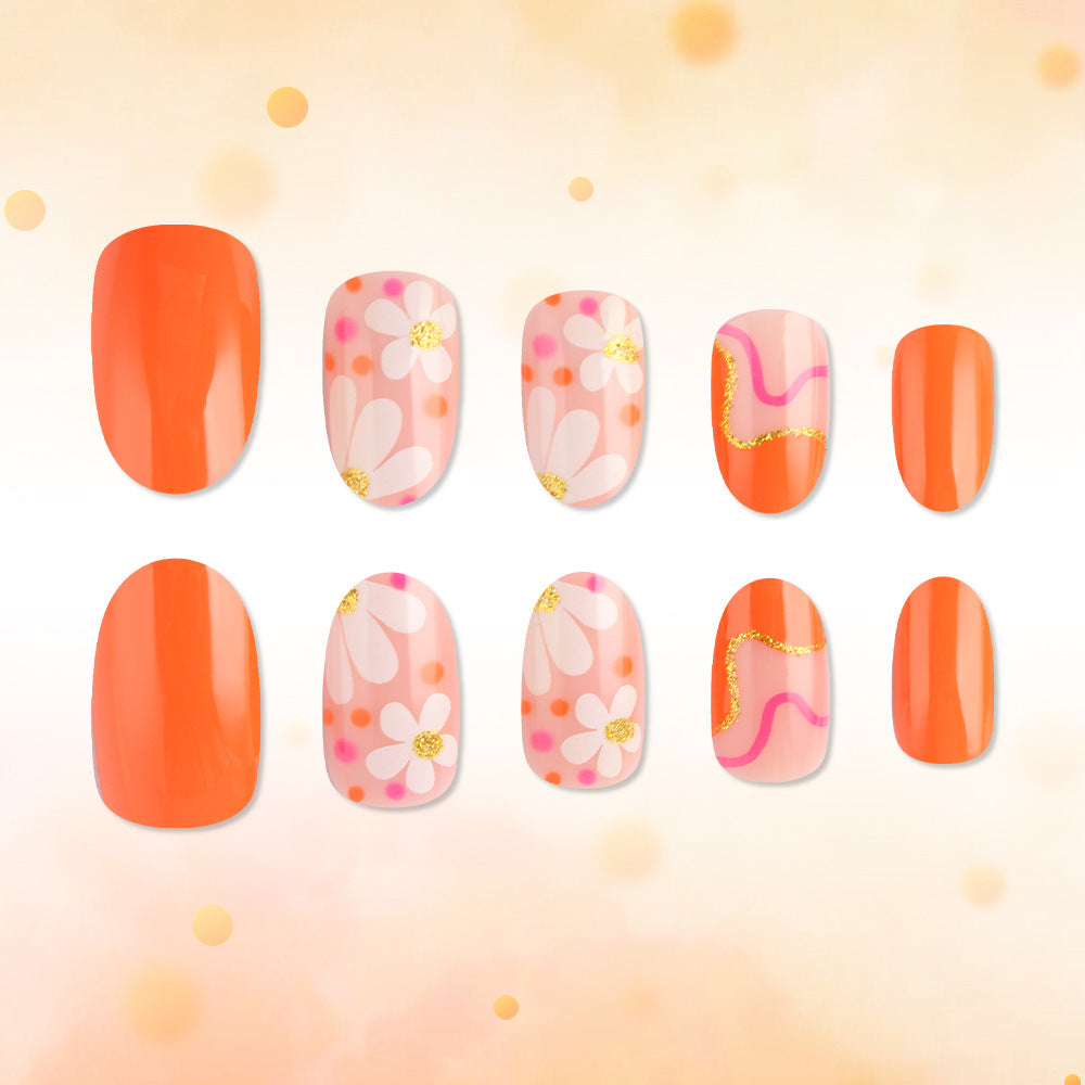 Sunny Floral Delight Medium Oval Bright Orange with Playful Flower Accents and Chic Glitter Lines Press-On Nail Set