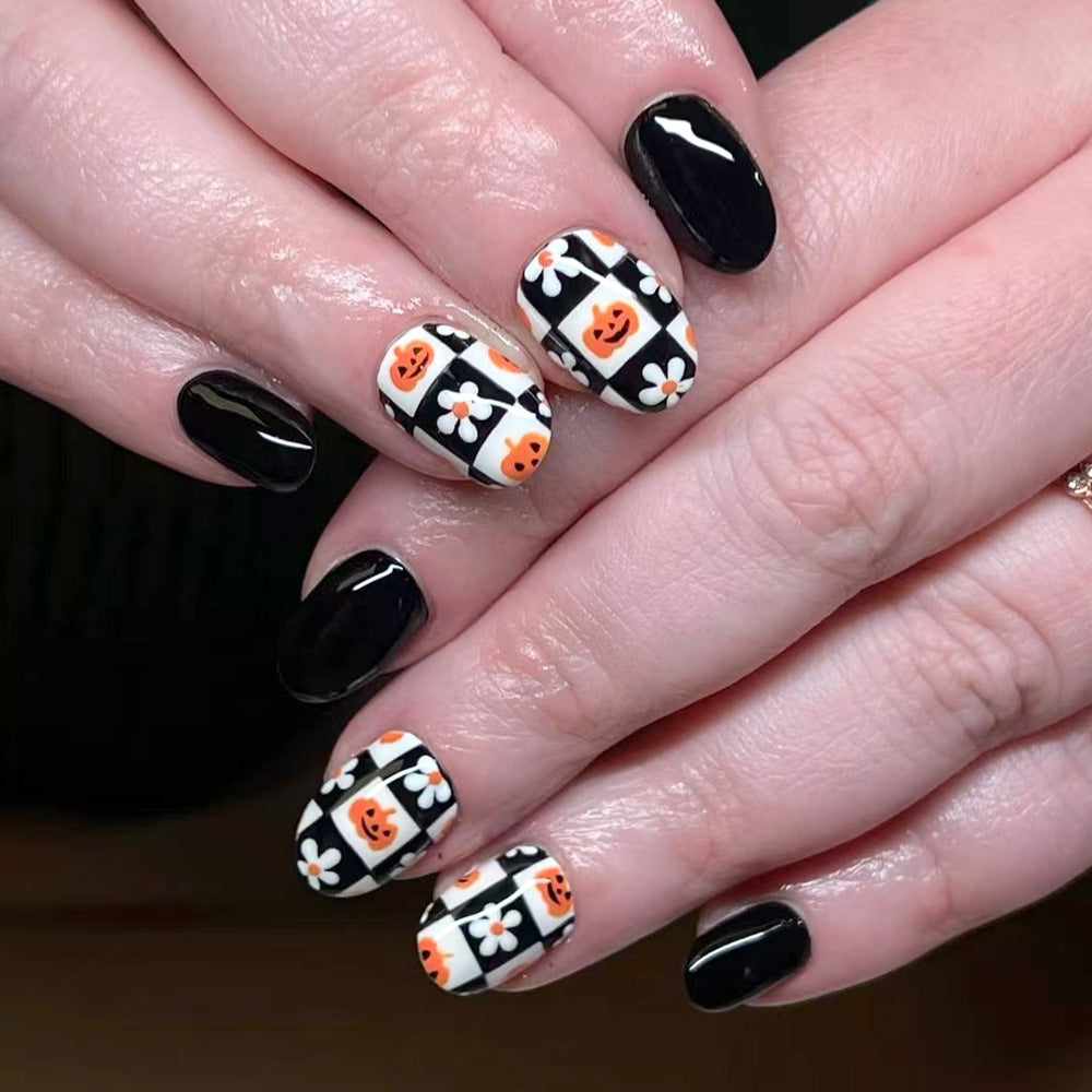 Spooky Chic Medium Oval Black and White with Pumpkin and Daisy Design Press On Nail Set