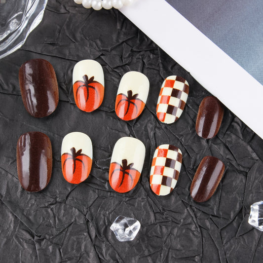 Autumn Harvest Glorious Medium Oval Shaped Pumpkin Orange and Chocolate Brown Press On Nail Set with Unique Checkerboard Design