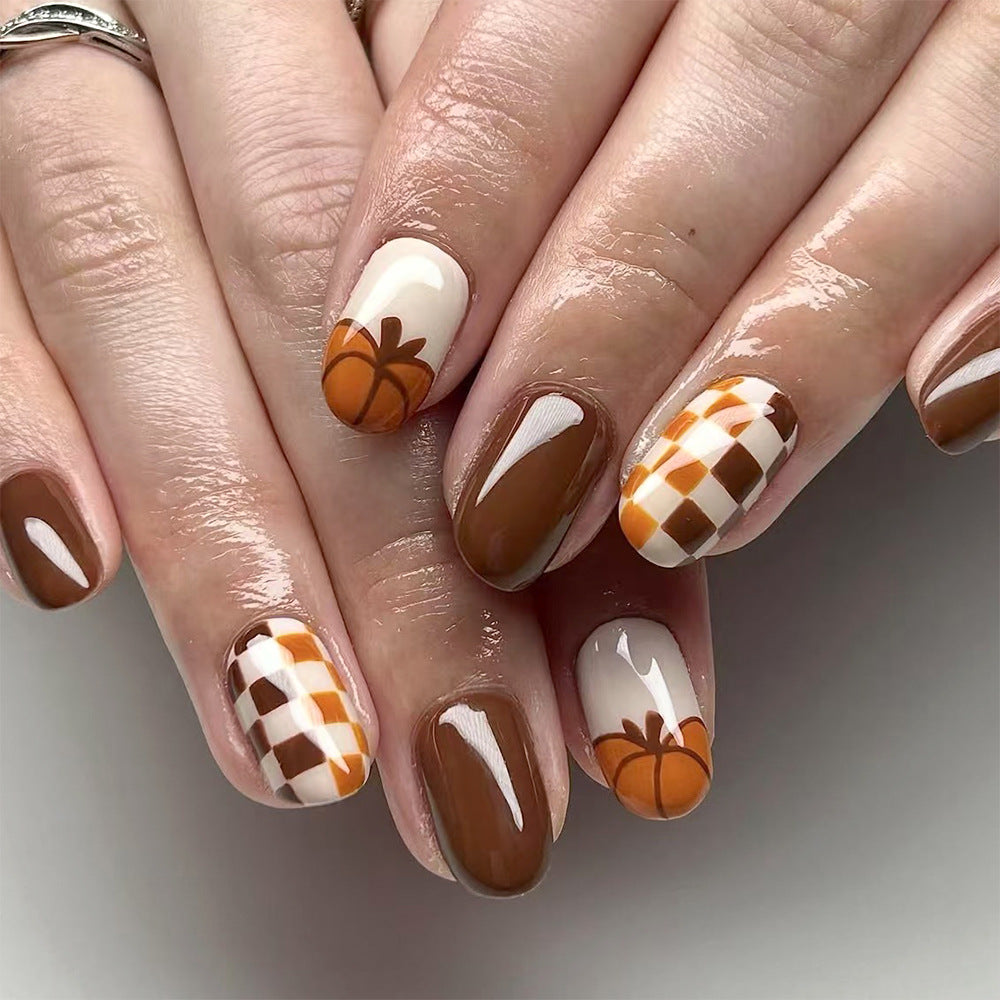 Autumn Vibes Medium Oval Brown and Cream Press On Nail Set with Pumpkin and Checkered Design