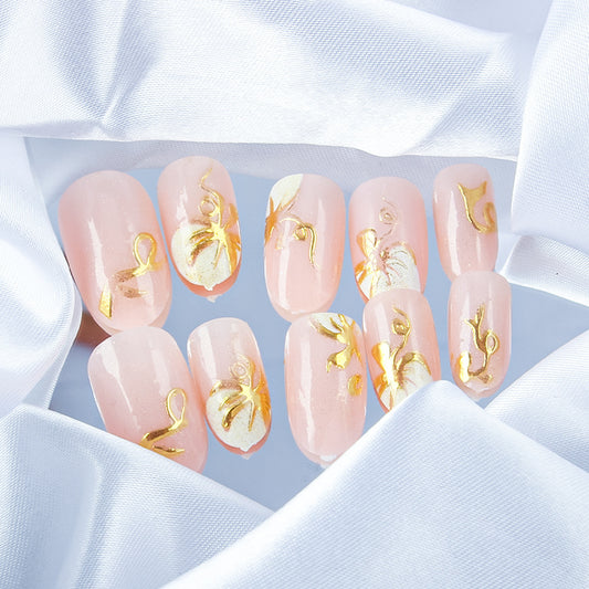 Whimsical Elegance Medium Oval Light Pink with Gold Foil Detailing Press On Nails Set